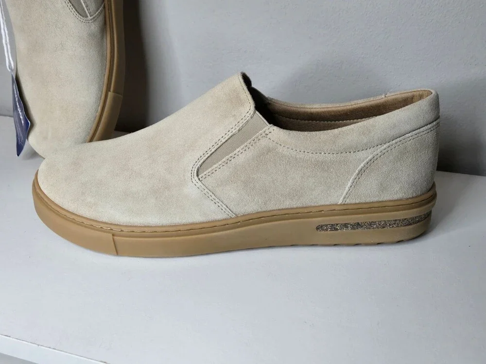 Unisex Birkenstock Oswego Suede Slip-On Shoes in Sandcastle Tan